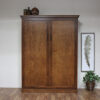 Wallbed with dark finish closed with no piers